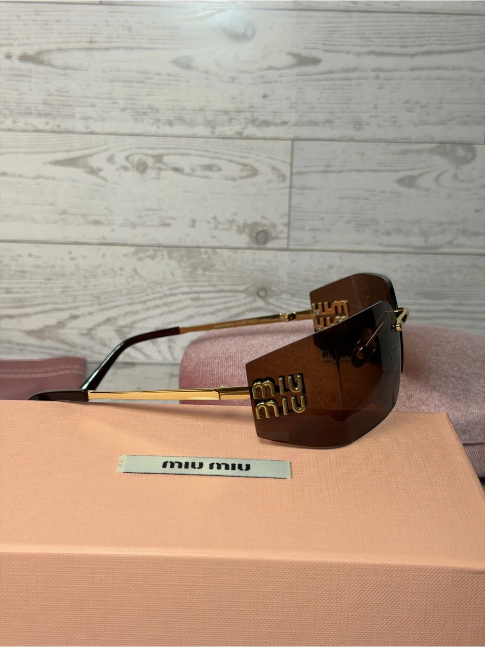 Miu Miu Brown Oversized Shield Sunglasses with Gold Accents